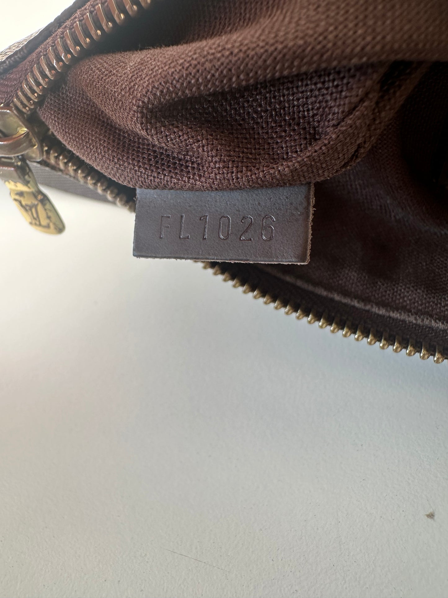 Louis Vuitton Pochette Melville