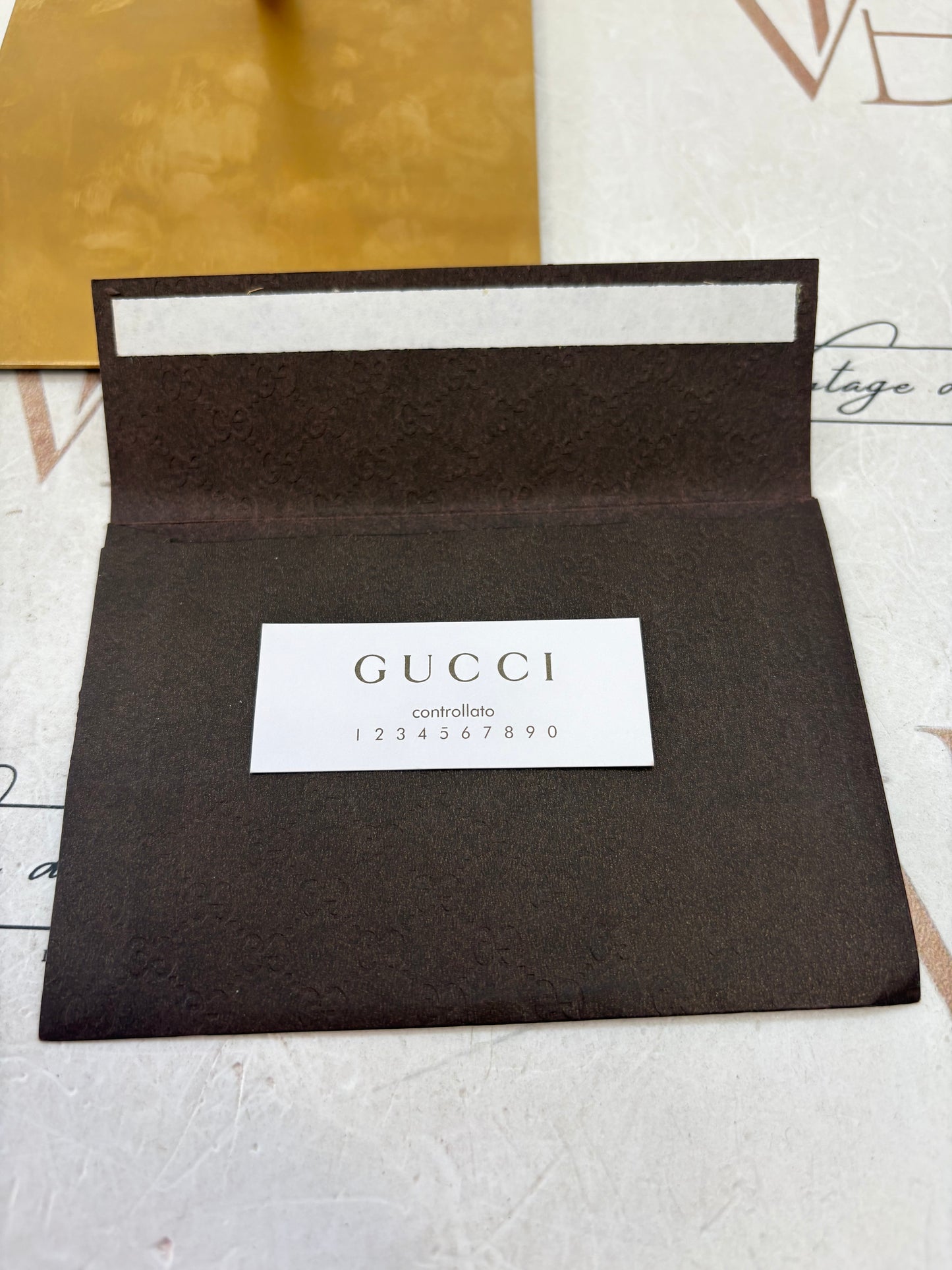 018878 - Gucci Beige PVC GG