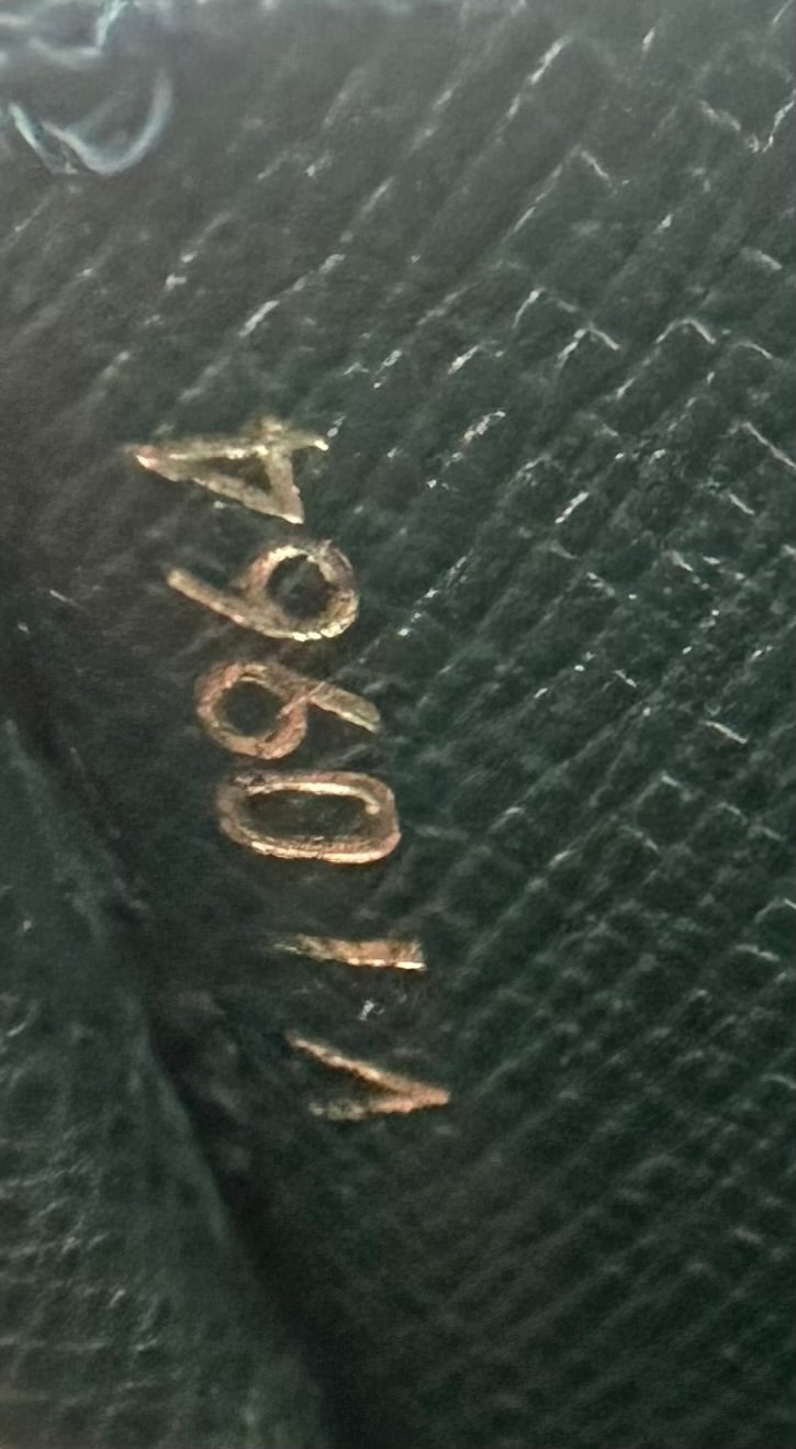 Louis Vuitton Taiga Serviette Kourad