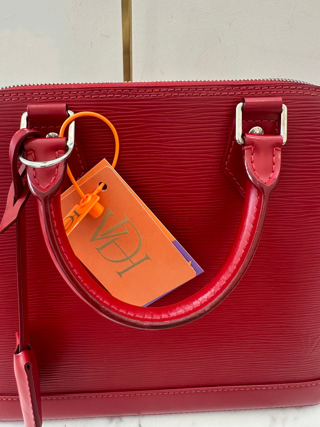 Louis Vuitton Alma Epi red