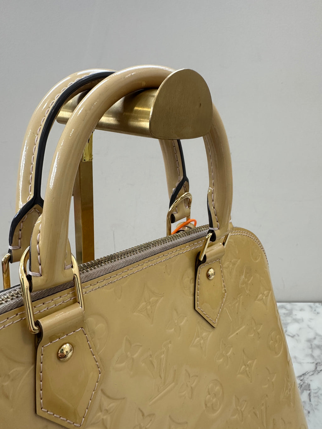Louis Vuitton Alma Vernis Beige