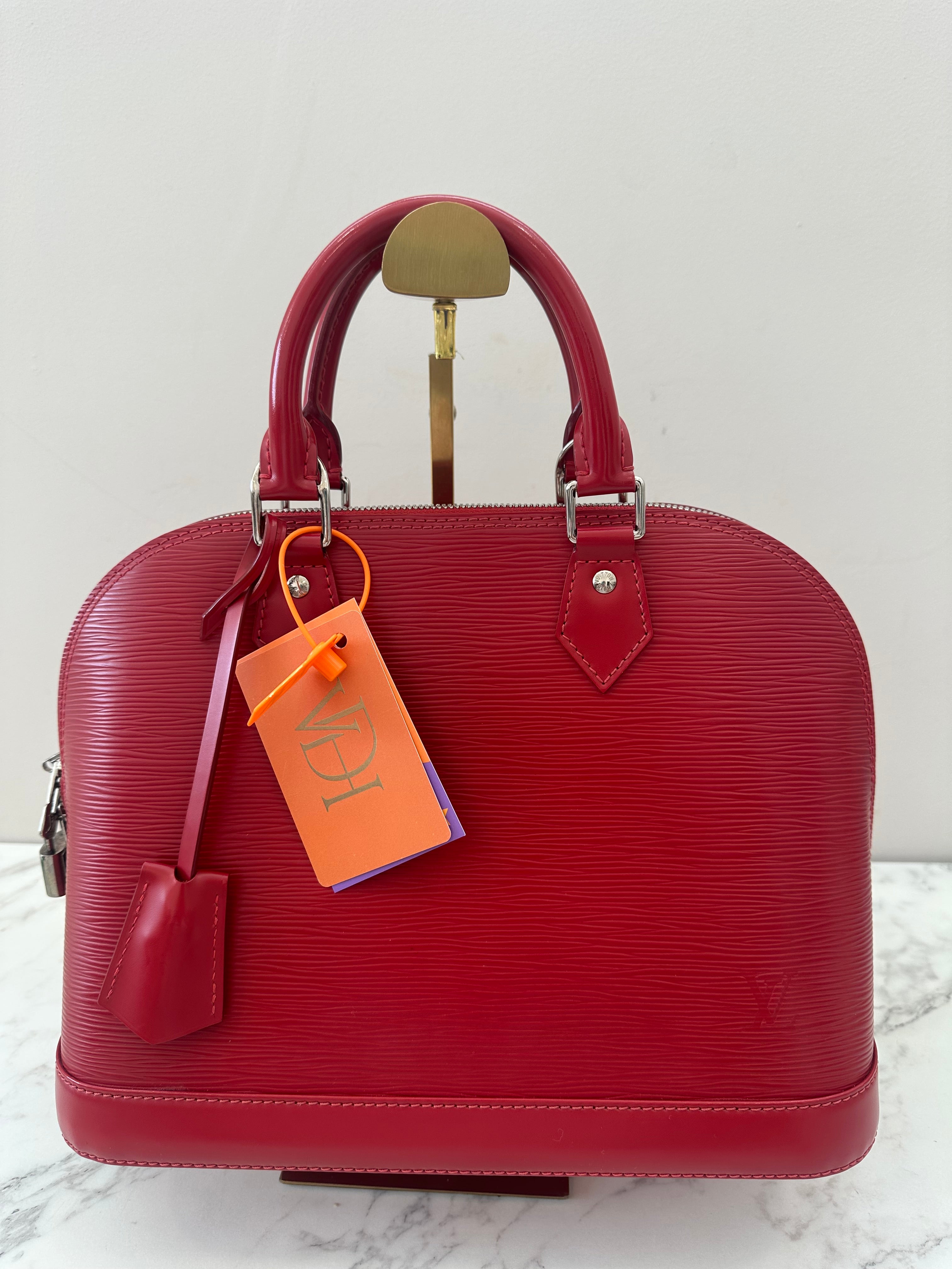 Louis Vuitton Alma Epi red