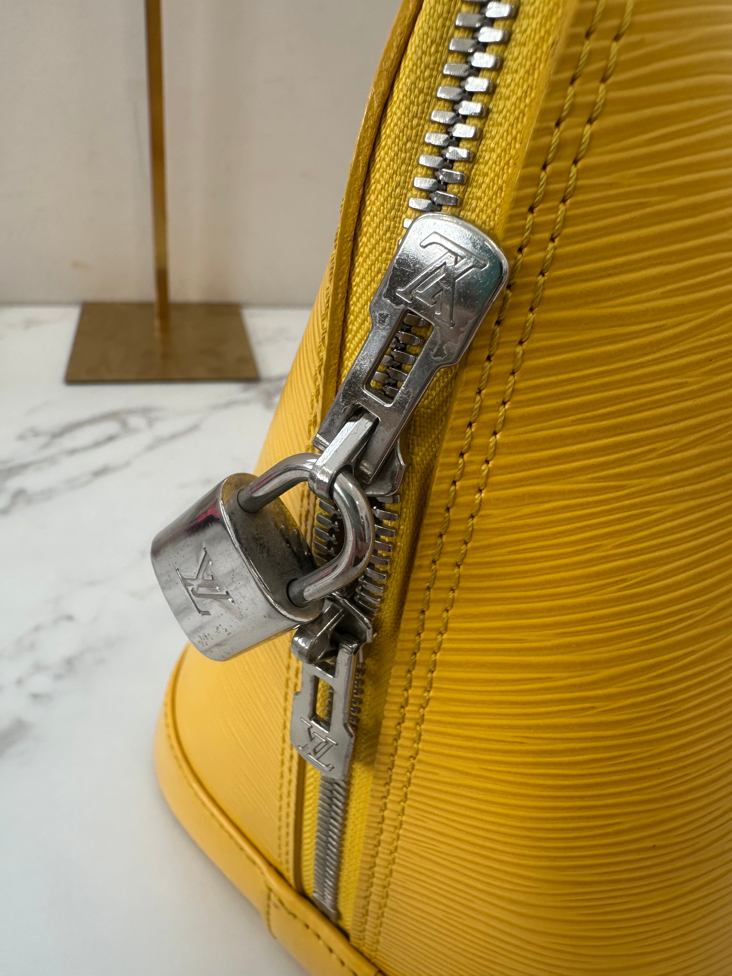Louis Vuitton Alma Epi Yellow