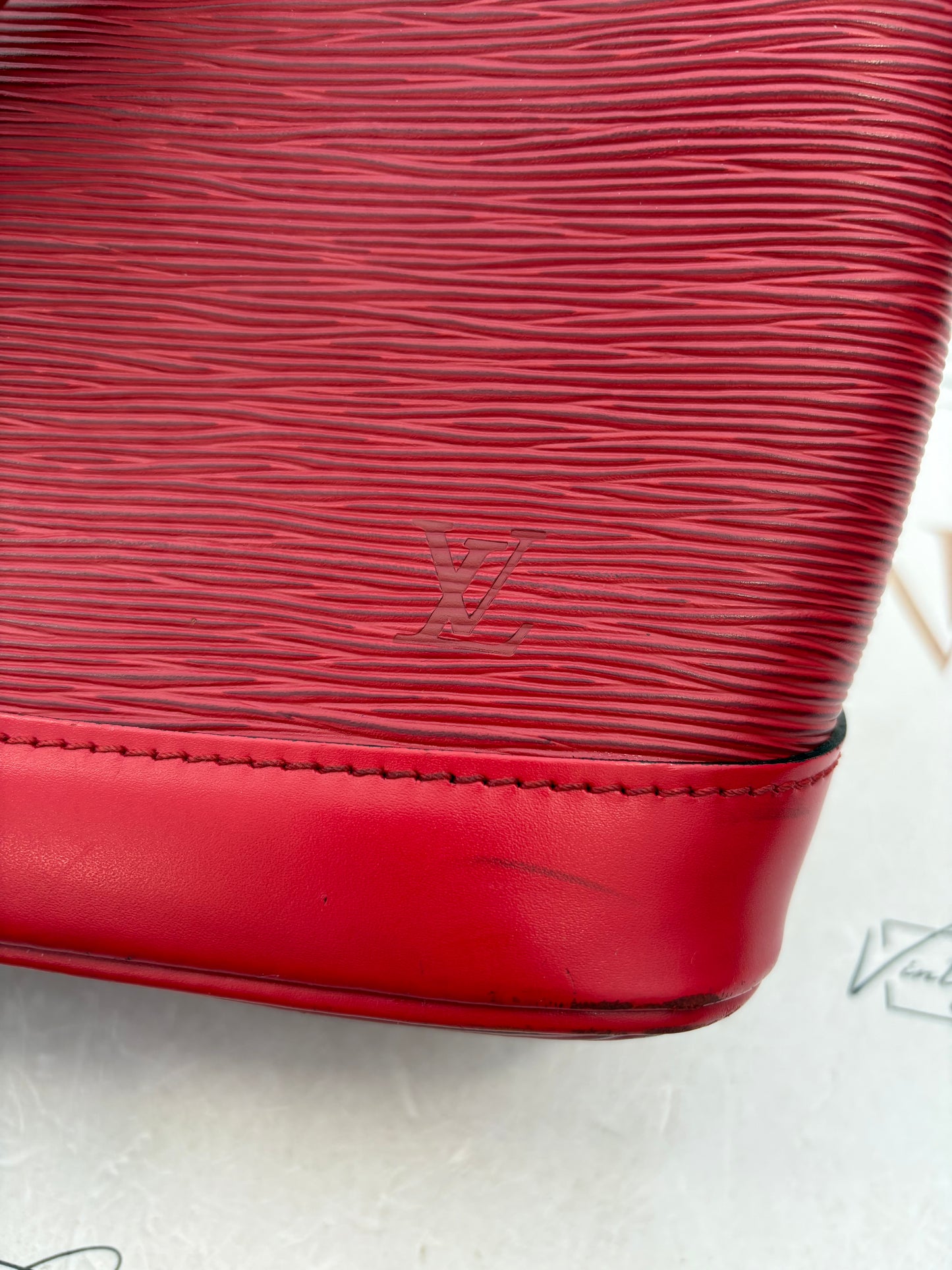 018899 - Louis Vuitton Alma Red Epi