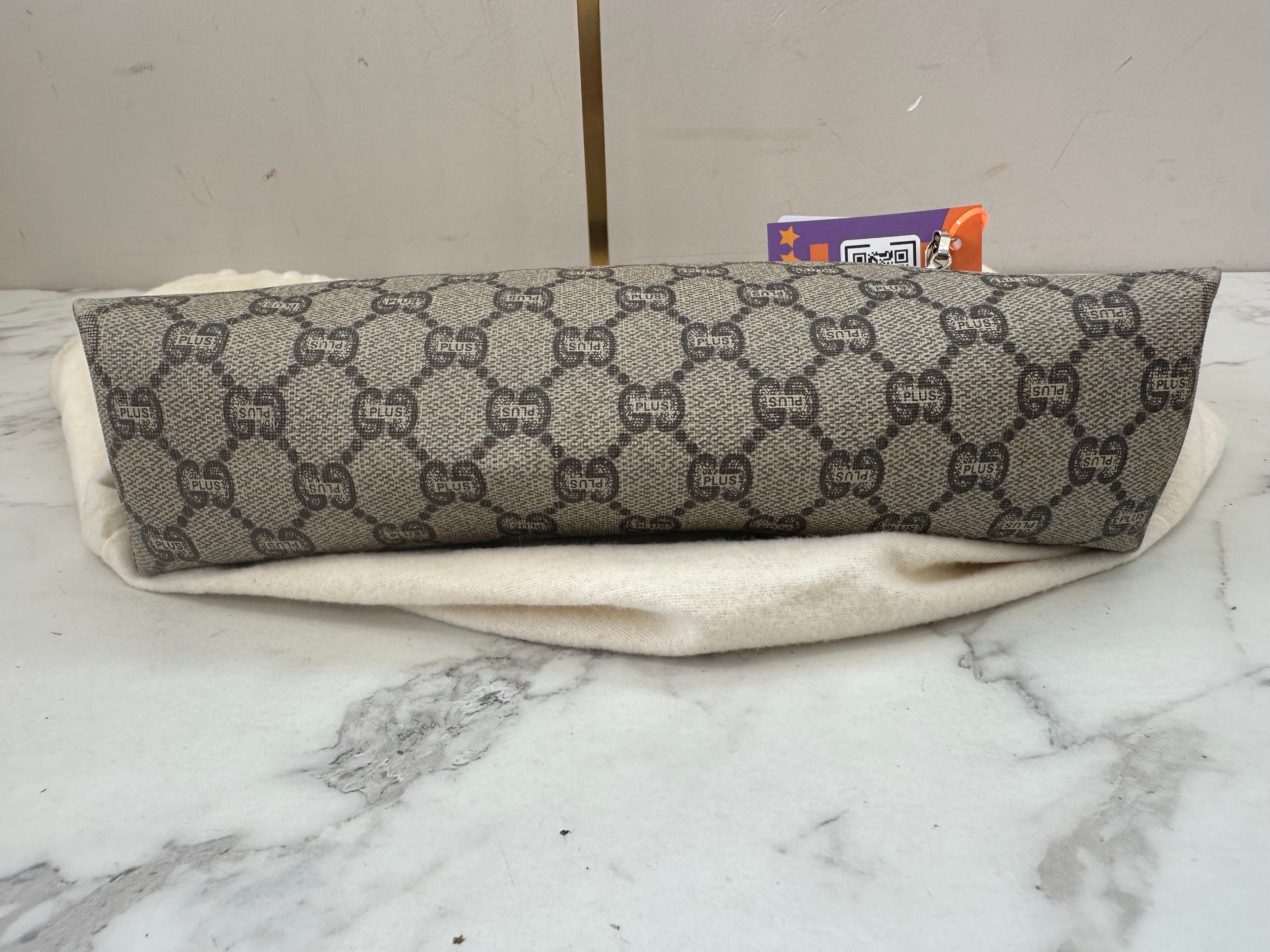 Gucci Pochette GG Plus