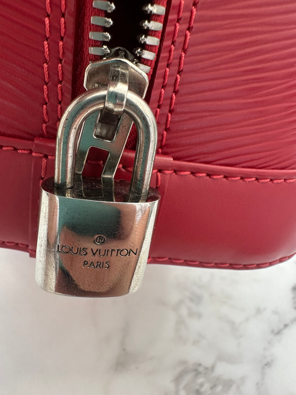 Louis Vuitton Alma Epi red