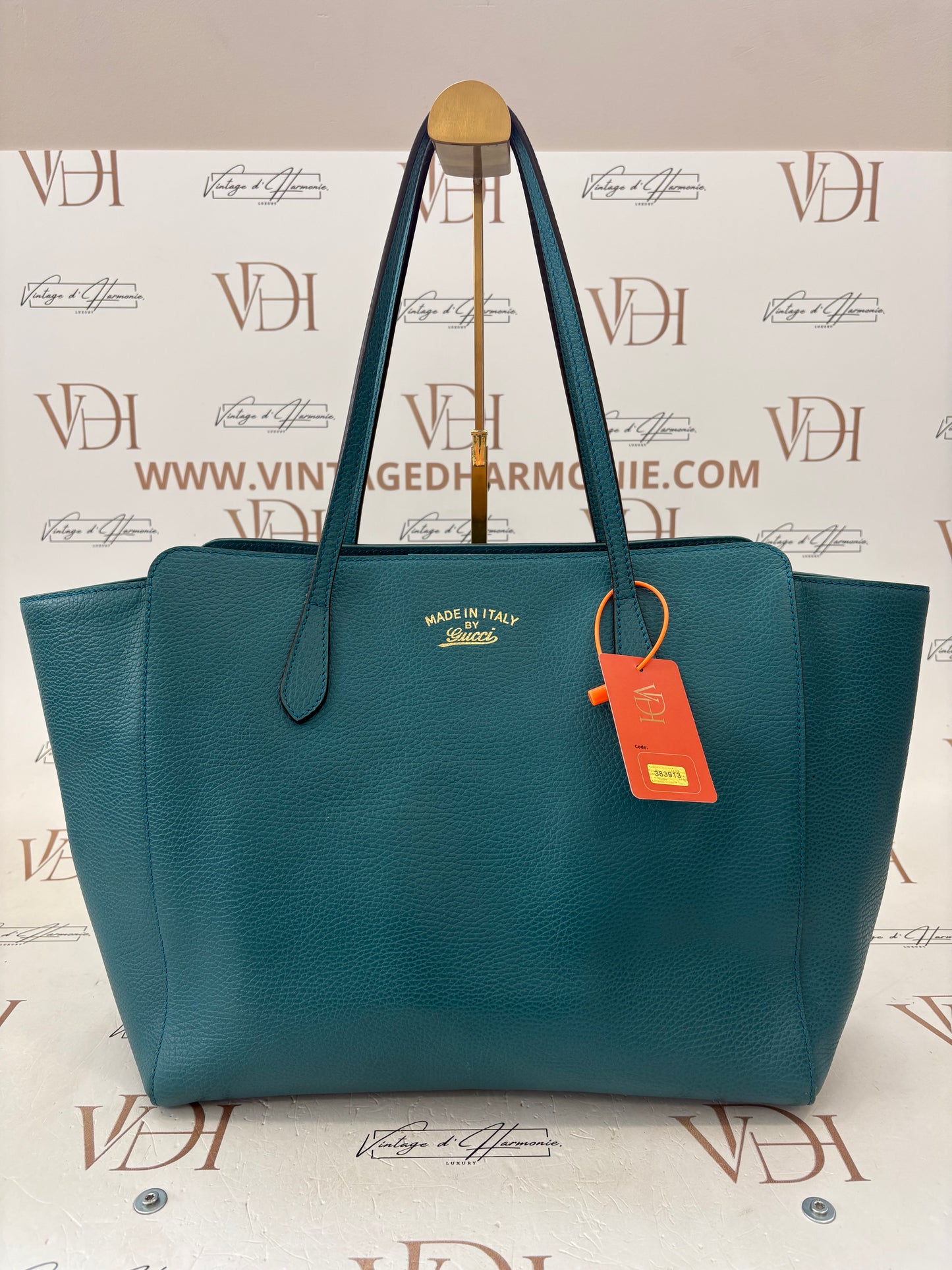 383913 - Gucci Swing
