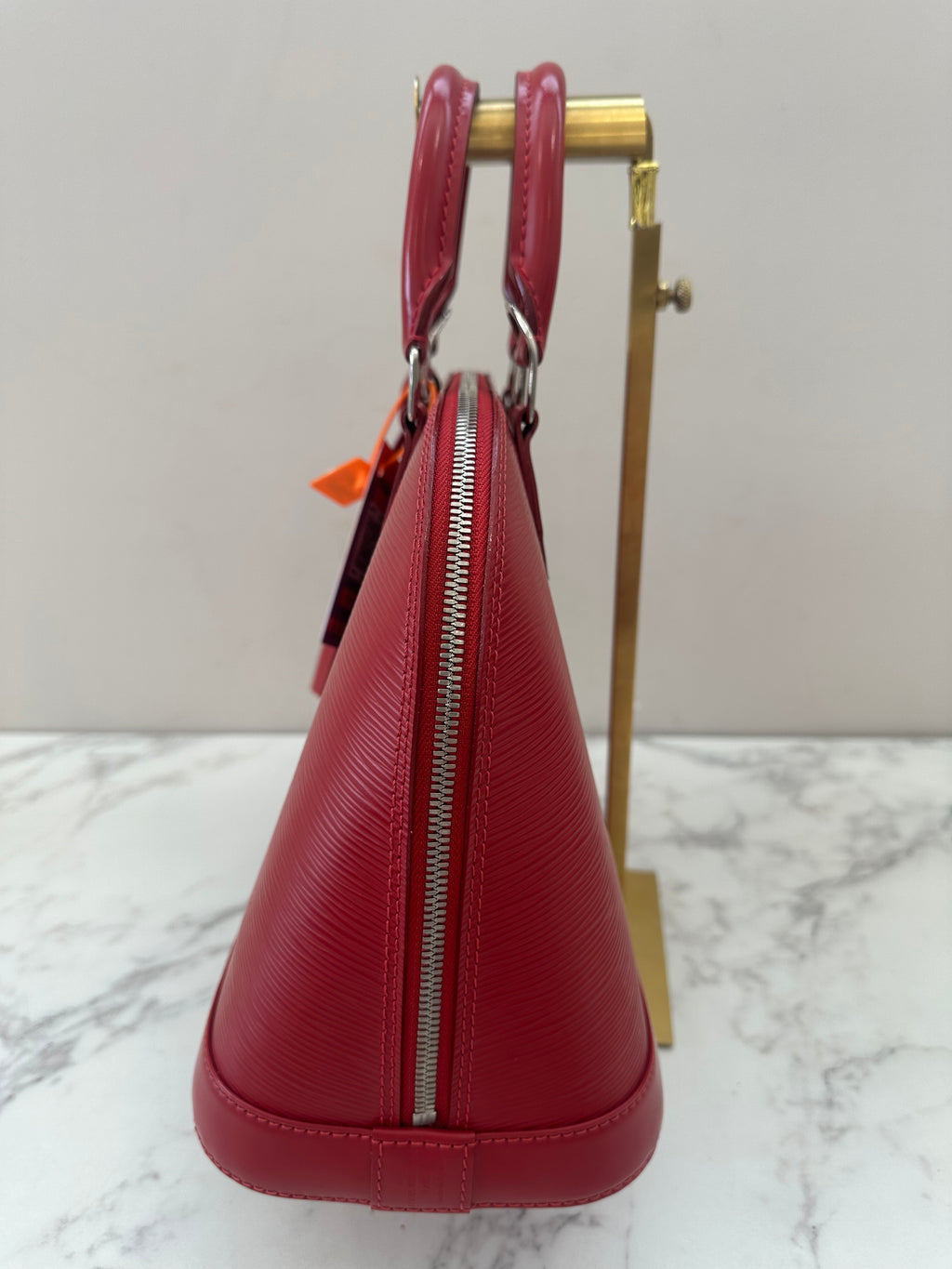Louis Vuitton Alma Epi red