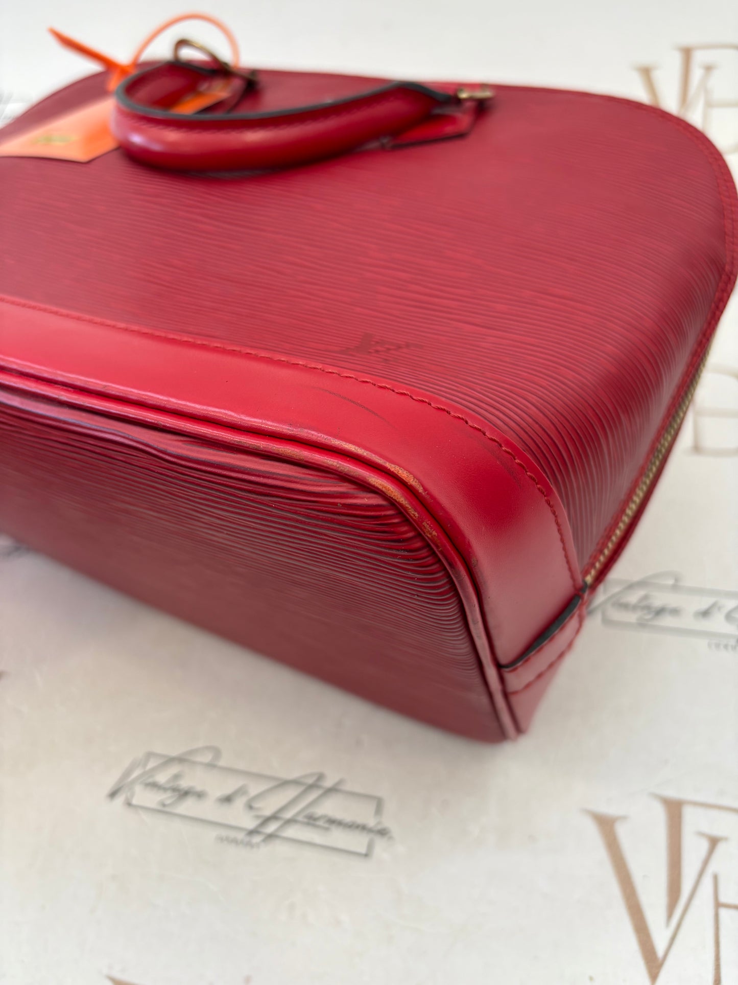 018899 - Louis Vuitton Alma Red Epi