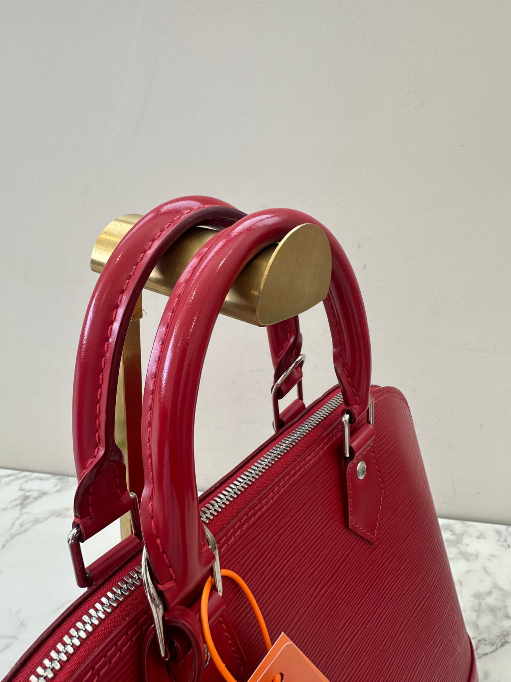 Louis Vuitton Alma Epi red