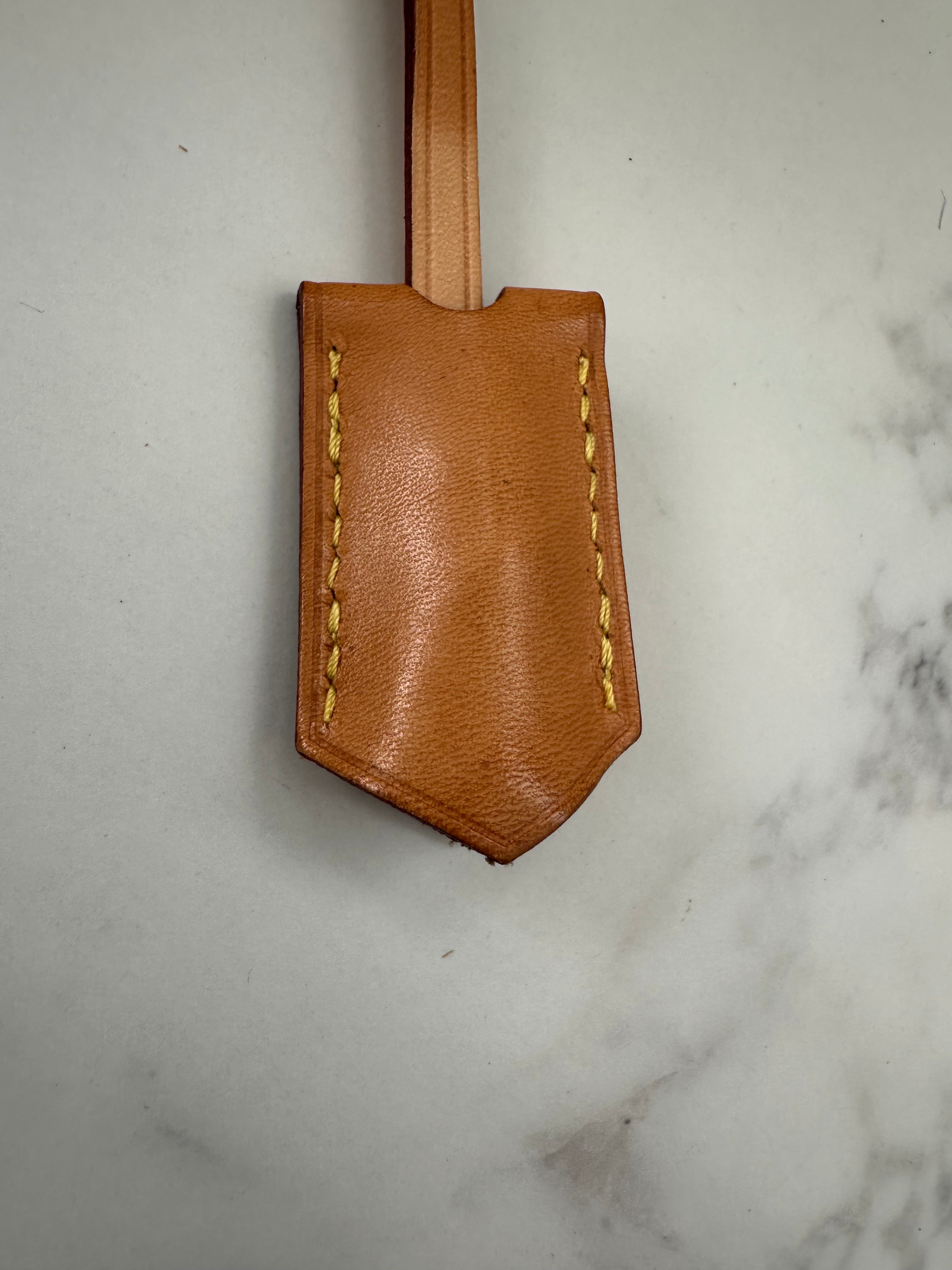 Louis Vuitton Clochette in Vacchetta