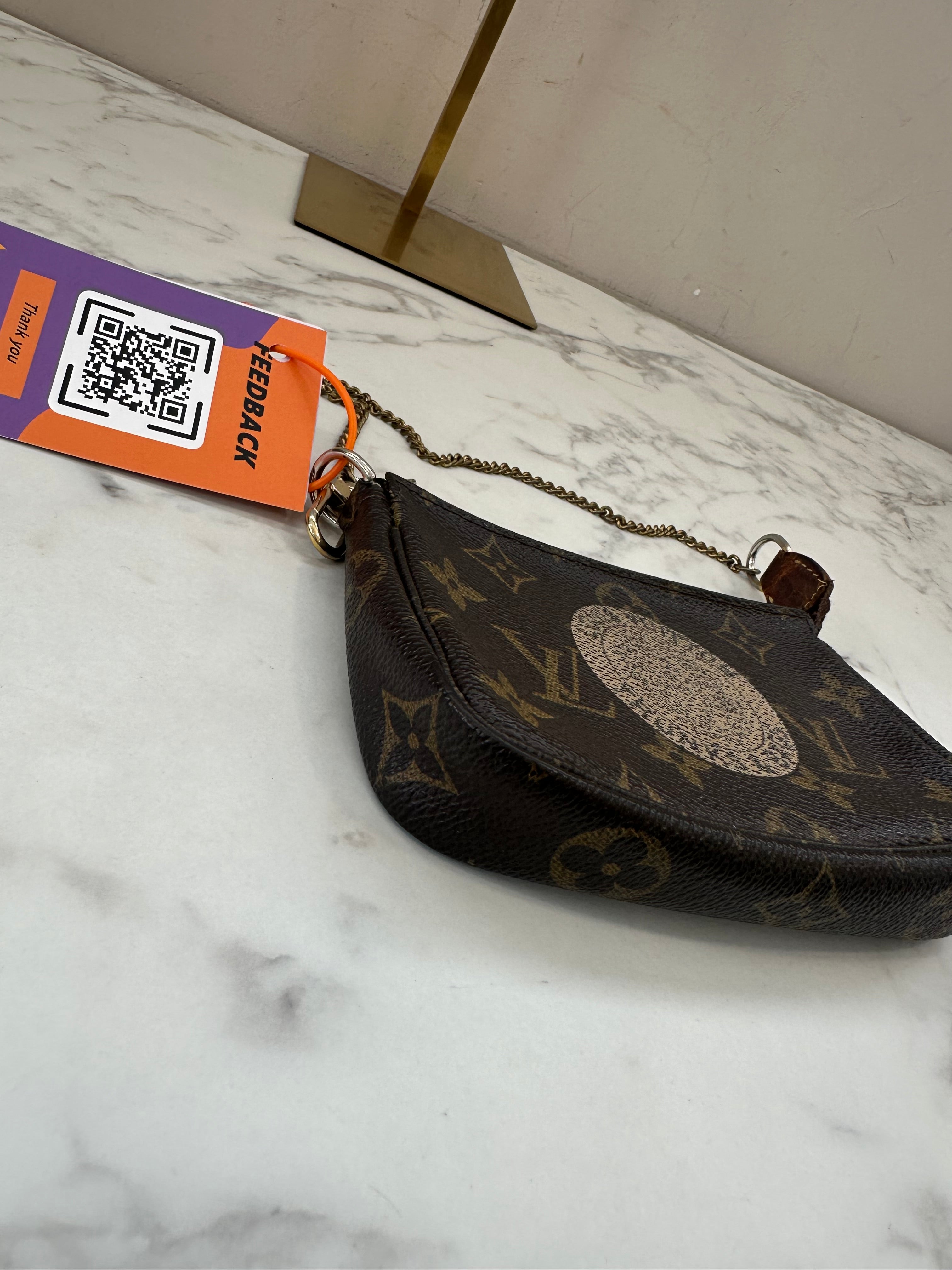 Louis Vuitton Mini Pochette Accessoires