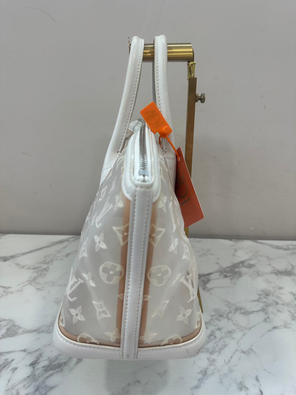 Louis Vuitton Blanc Monogram Transparent lockit east west