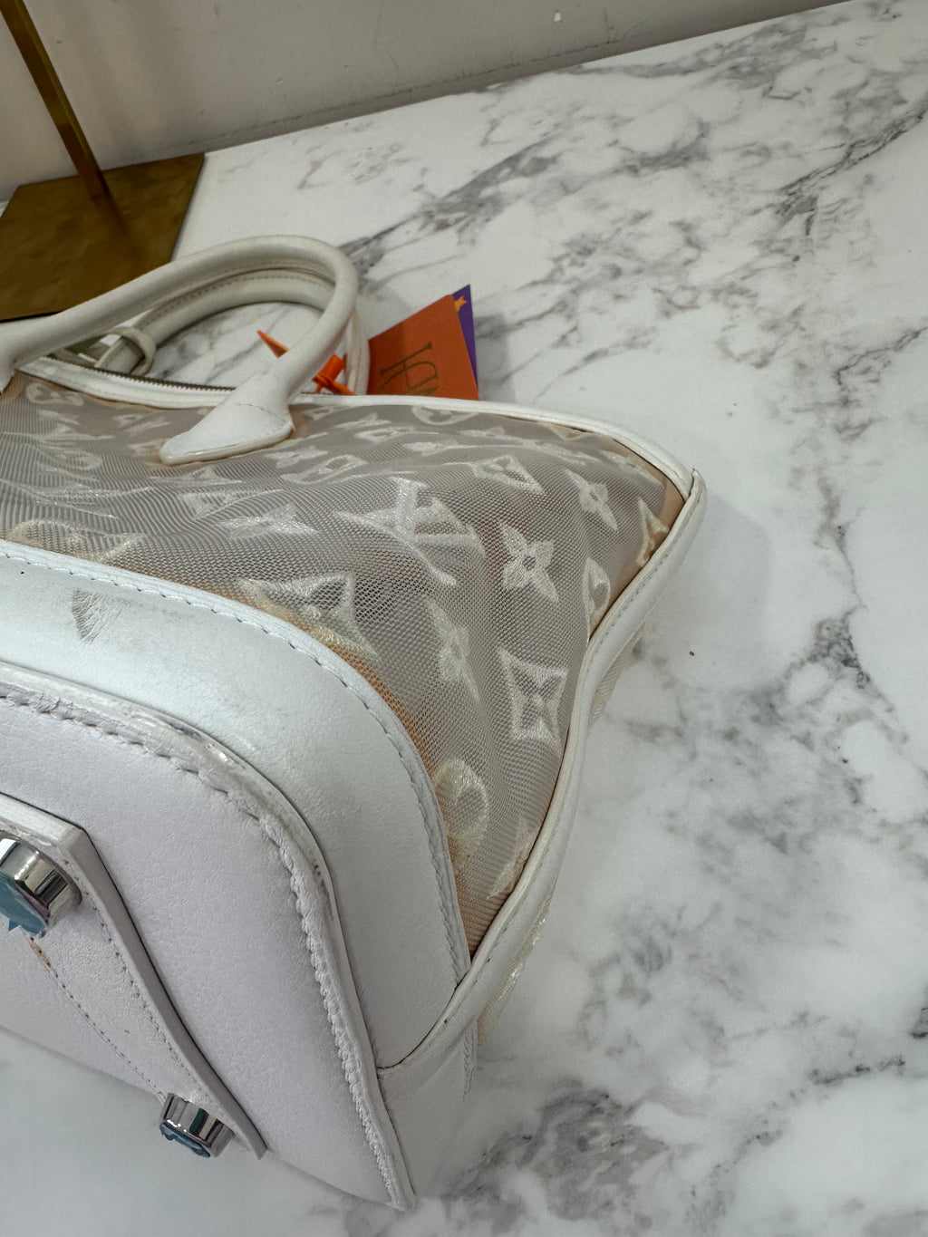 Louis Vuitton Blanc Monogram Transparent lockit east west