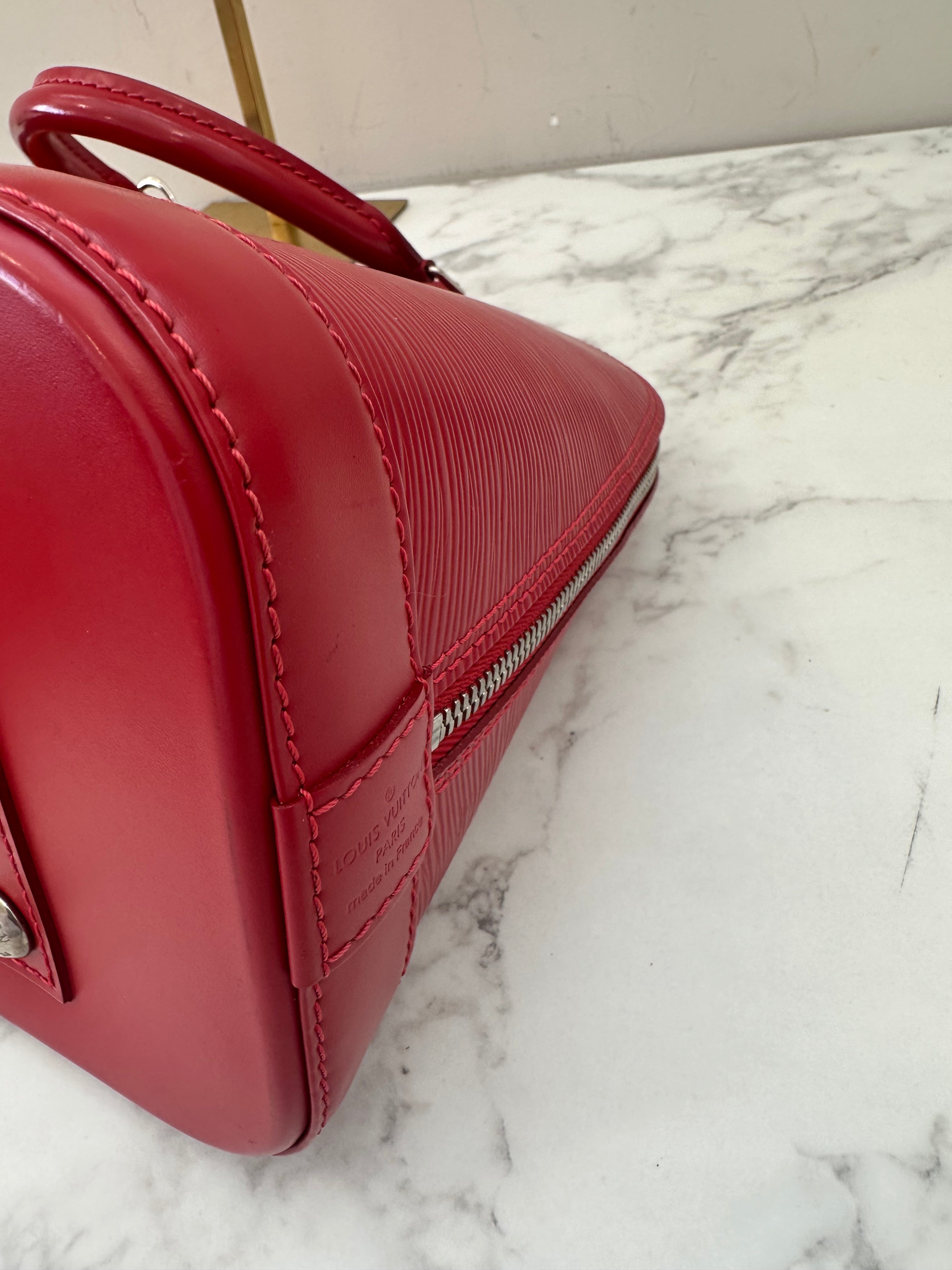 Louis Vuitton Alma Epi red
