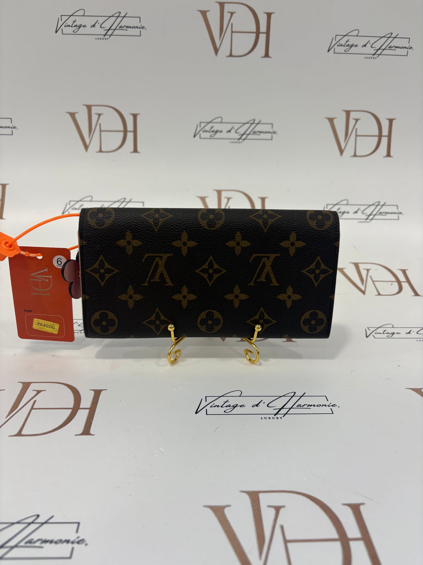 384000 - Louis Vuitton Emilie wallet