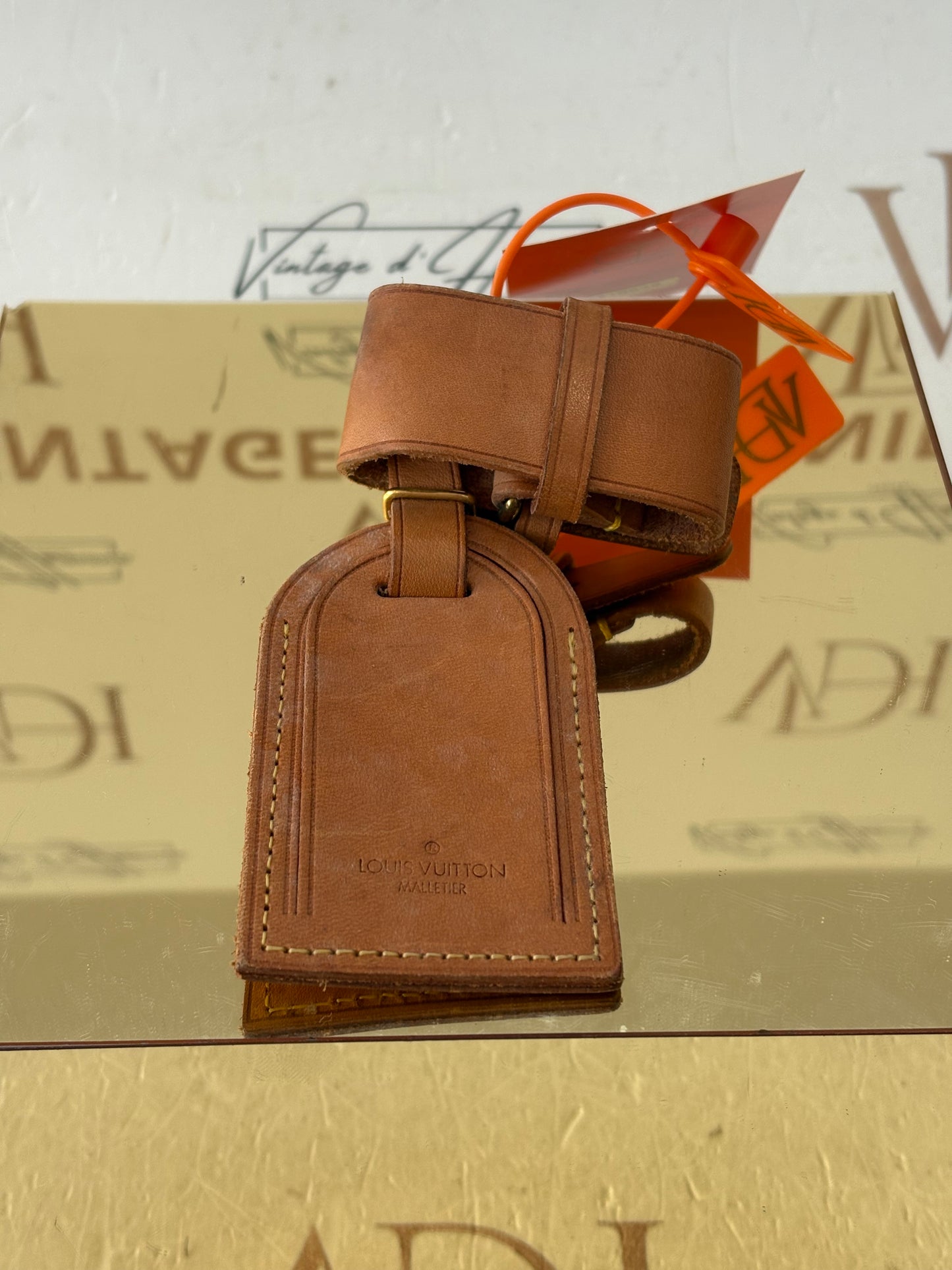 Louis Vuitton Keepall Tag + Chiudimanici