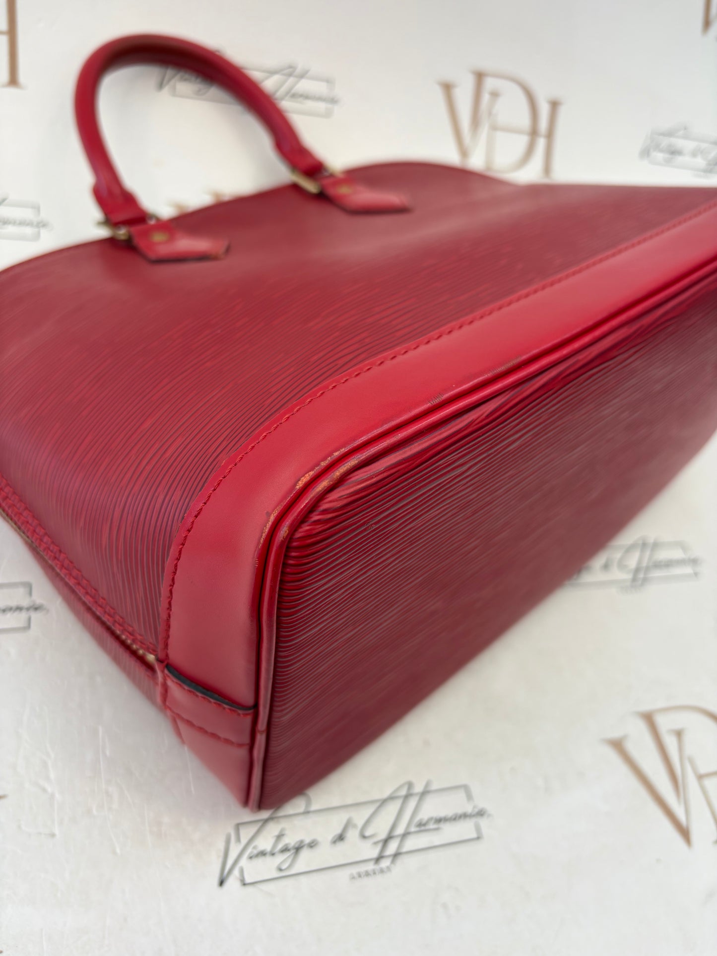 018899 - Louis Vuitton Alma Red Epi