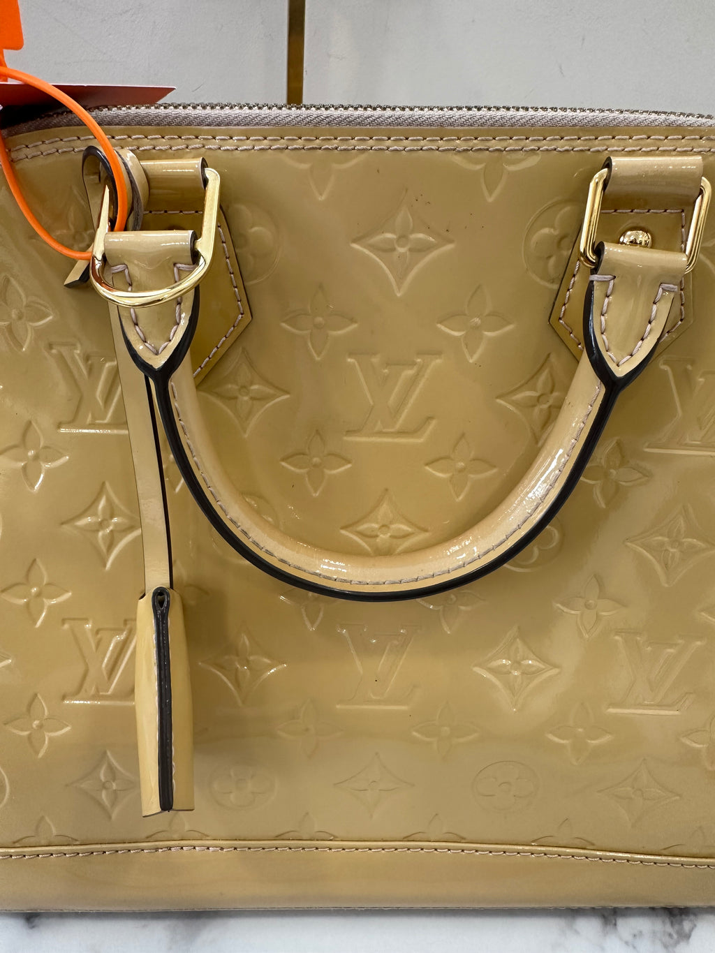 Louis Vuitton Alma Vernis Beige