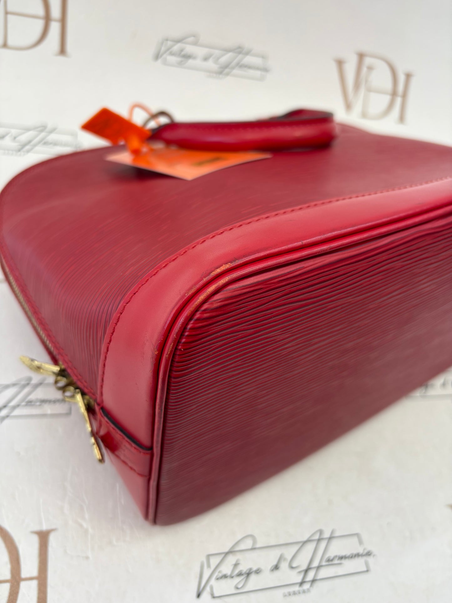 018899 - Louis Vuitton Alma Red Epi