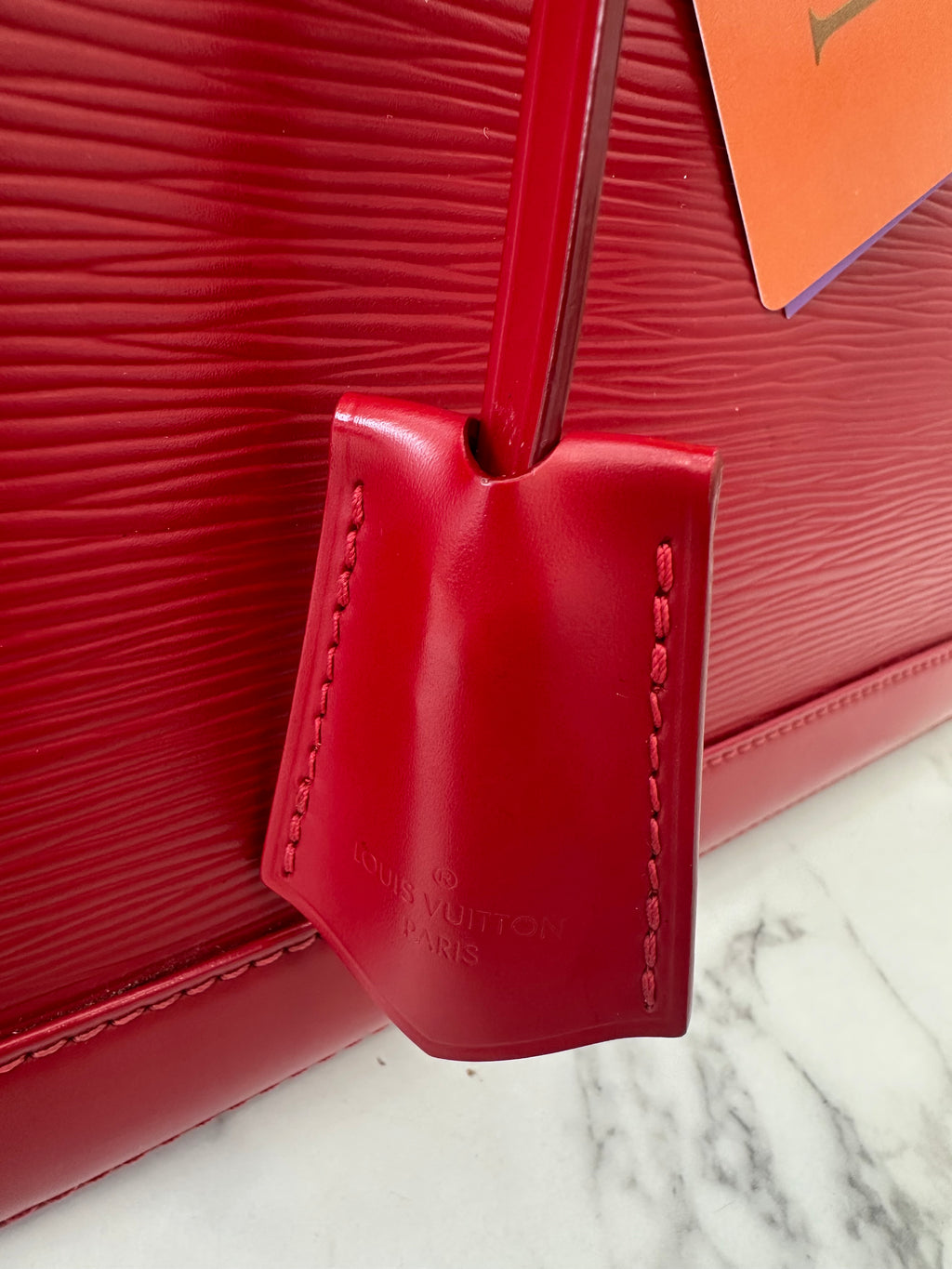 Louis Vuitton Alma Epi red