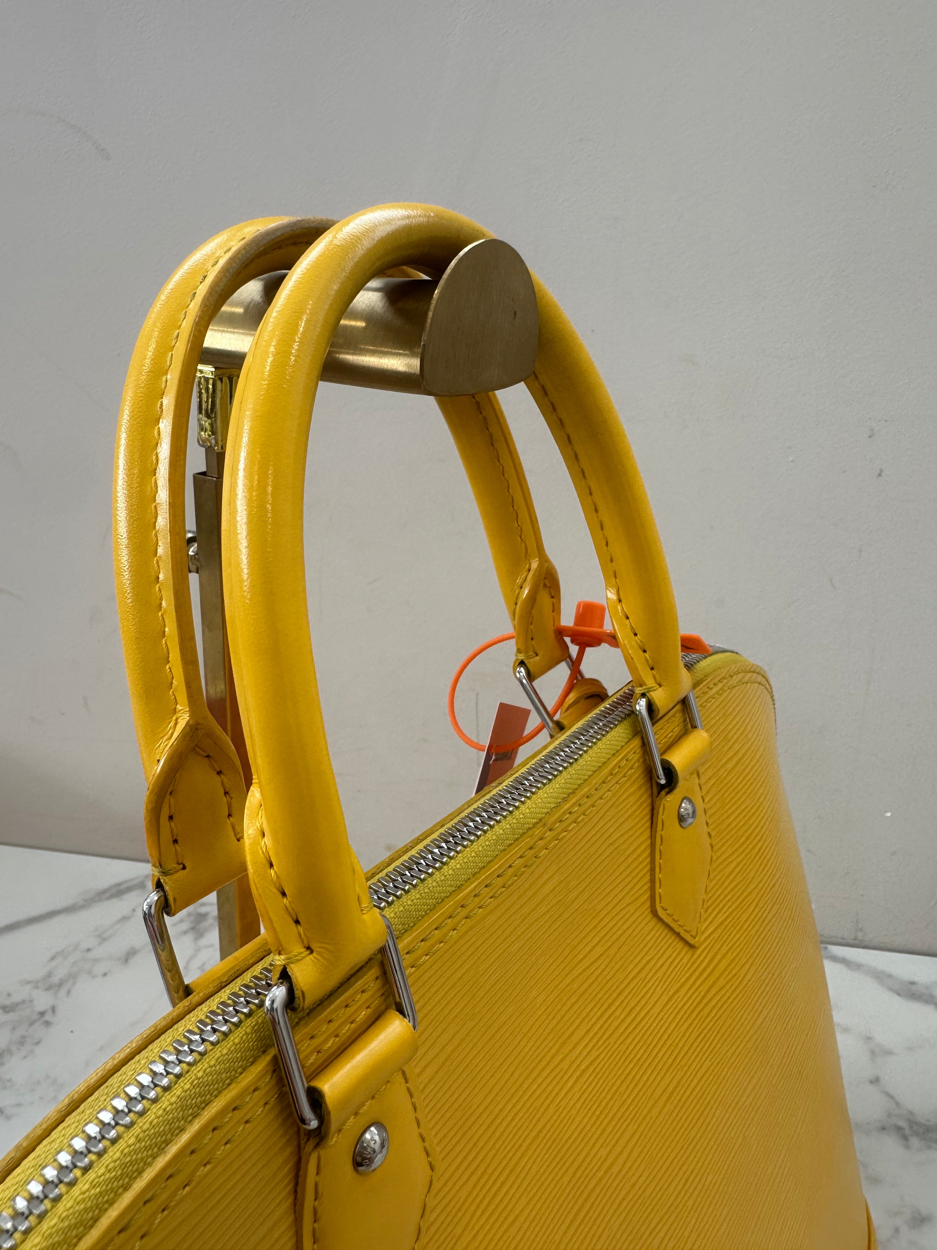 Louis Vuitton Alma Epi Yellow