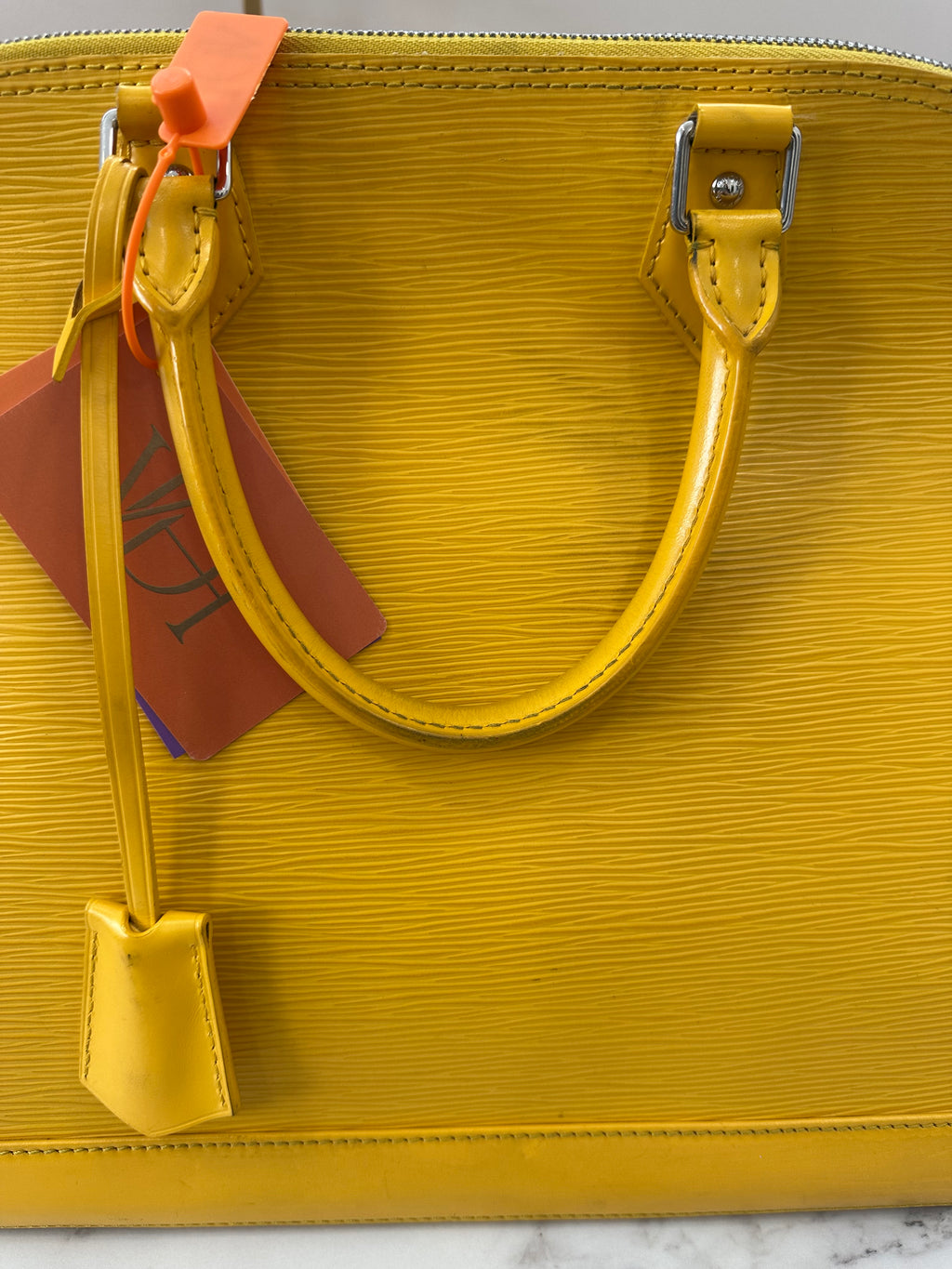 Louis Vuitton Alma Epi Yellow