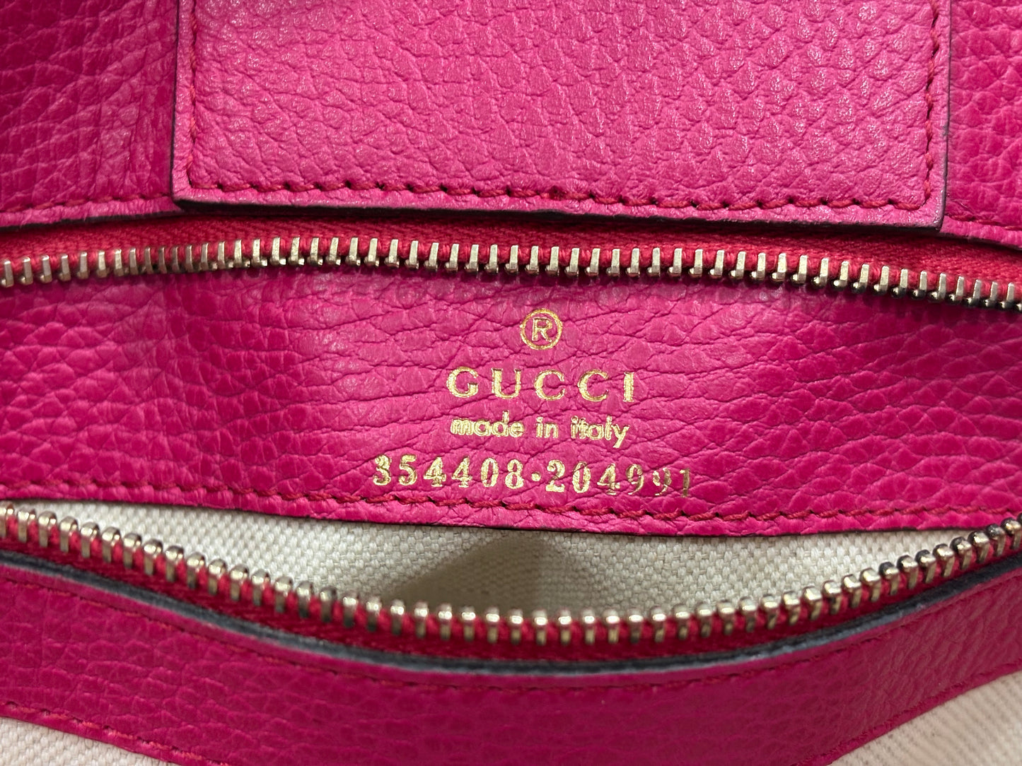 201590 - Gucci Swing