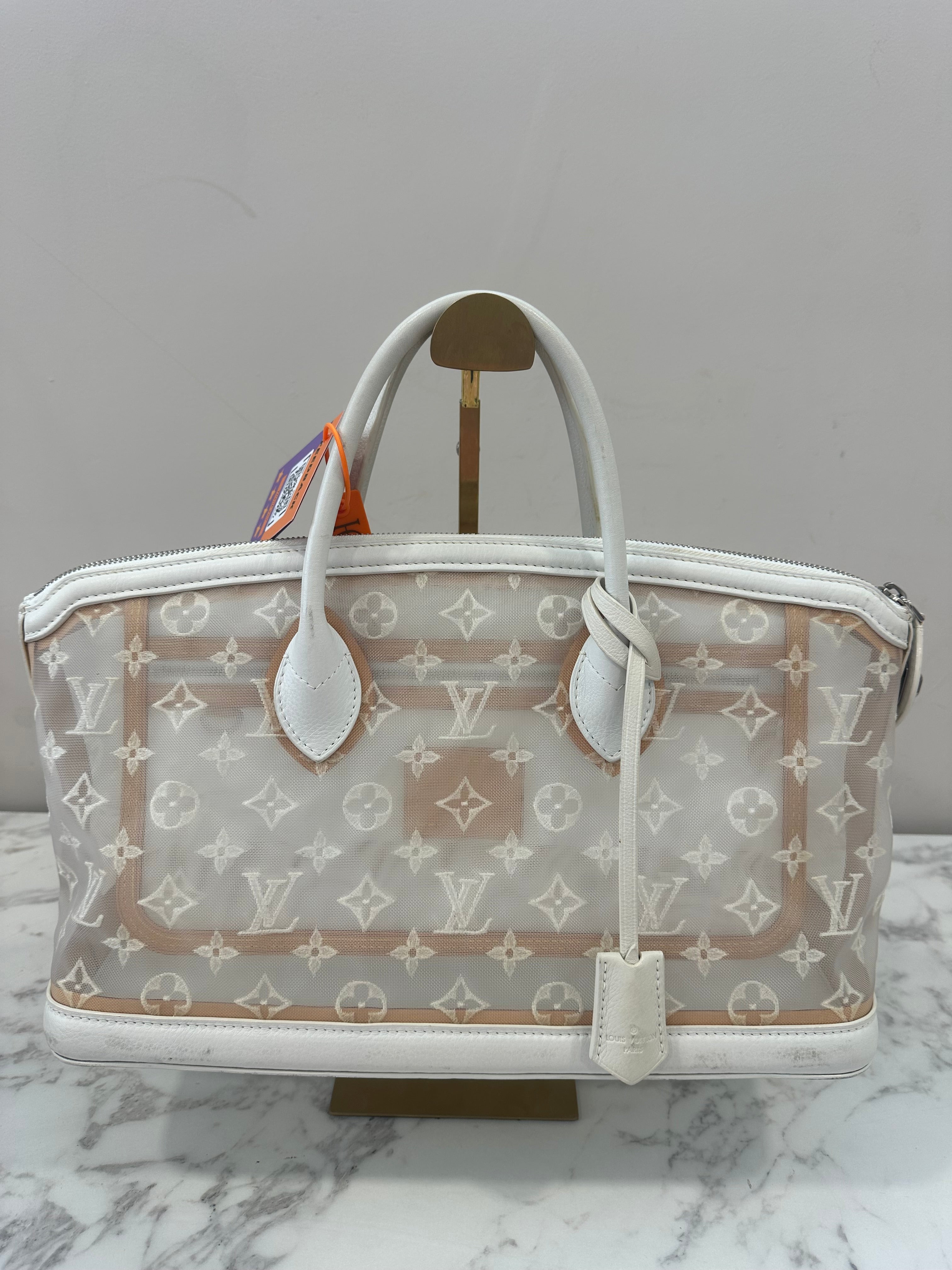 Louis Vuitton Blanc Monogram Transparent lockit east west