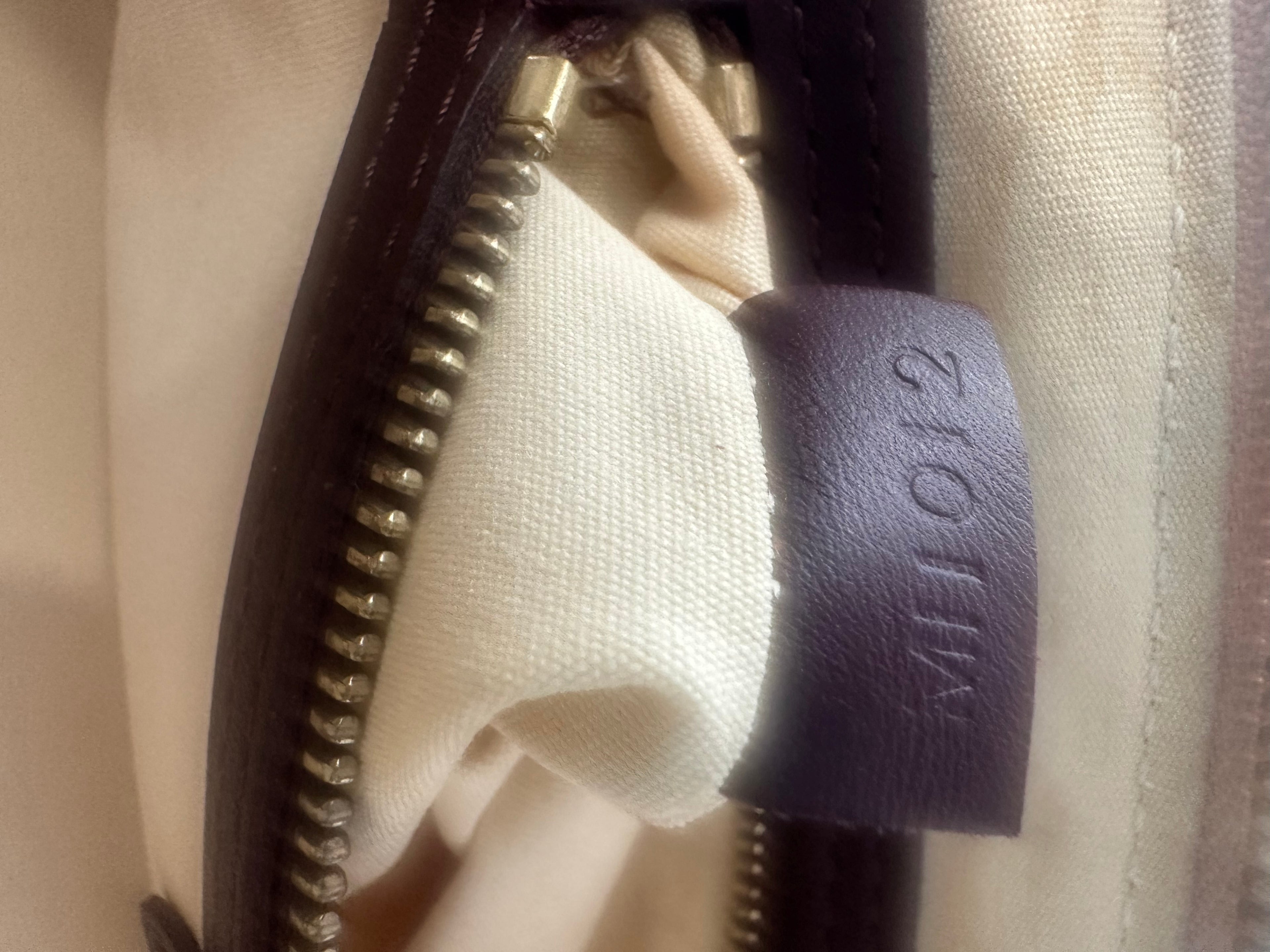 Louis Vuitton Alma Long