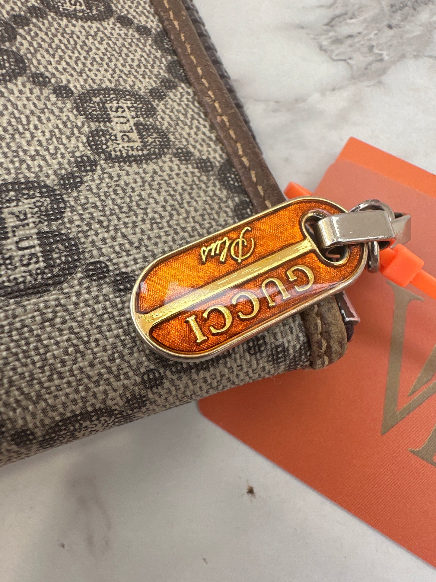 Gucci Pochette GG Plus