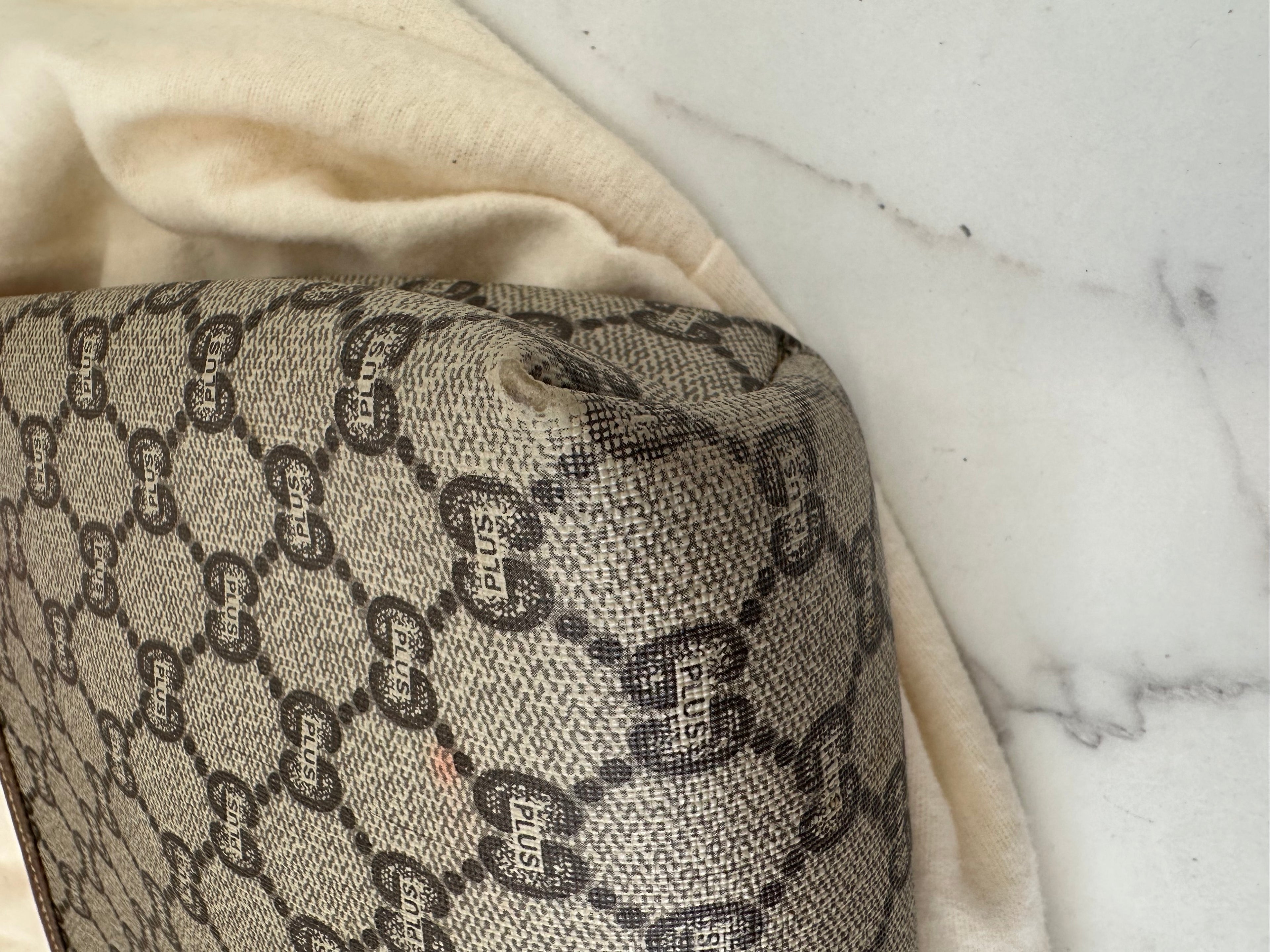 Gucci Pochette GG Plus