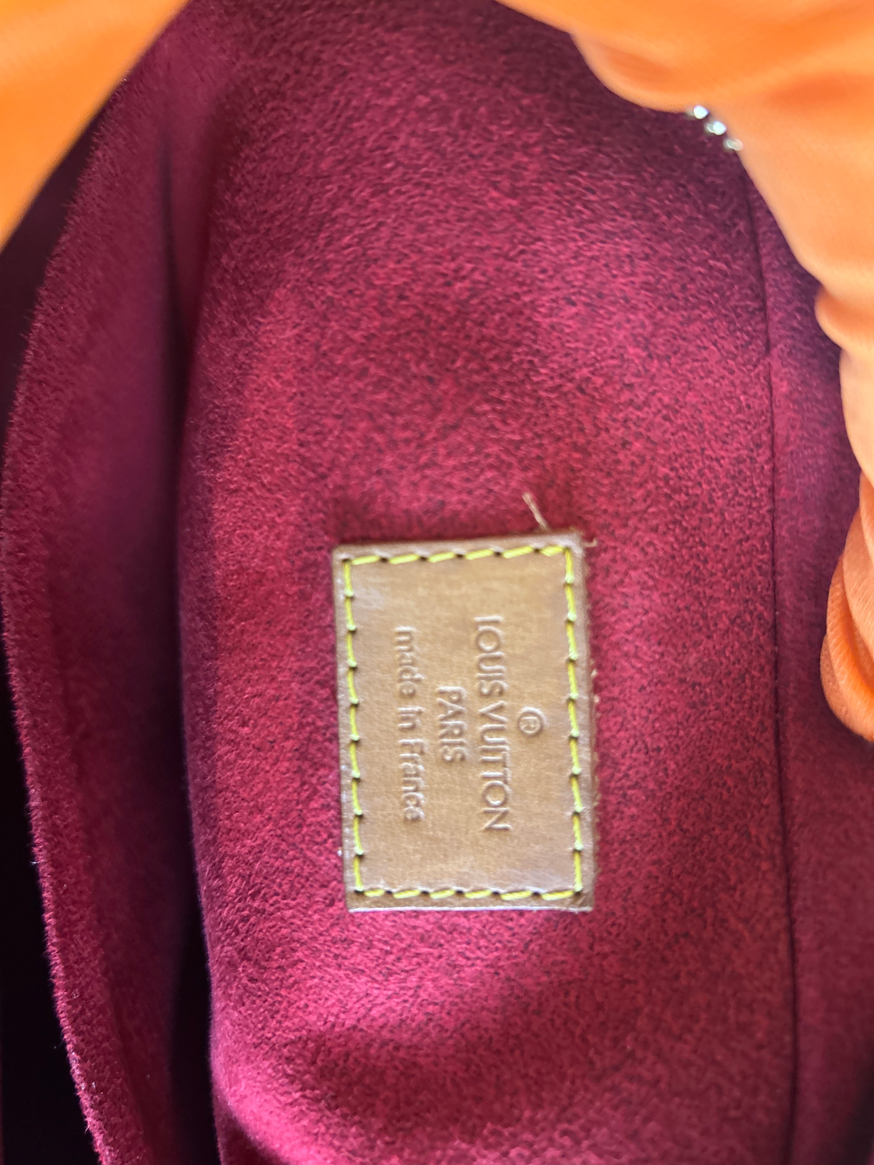 Borsa Louis Vuitton Excentri Cite