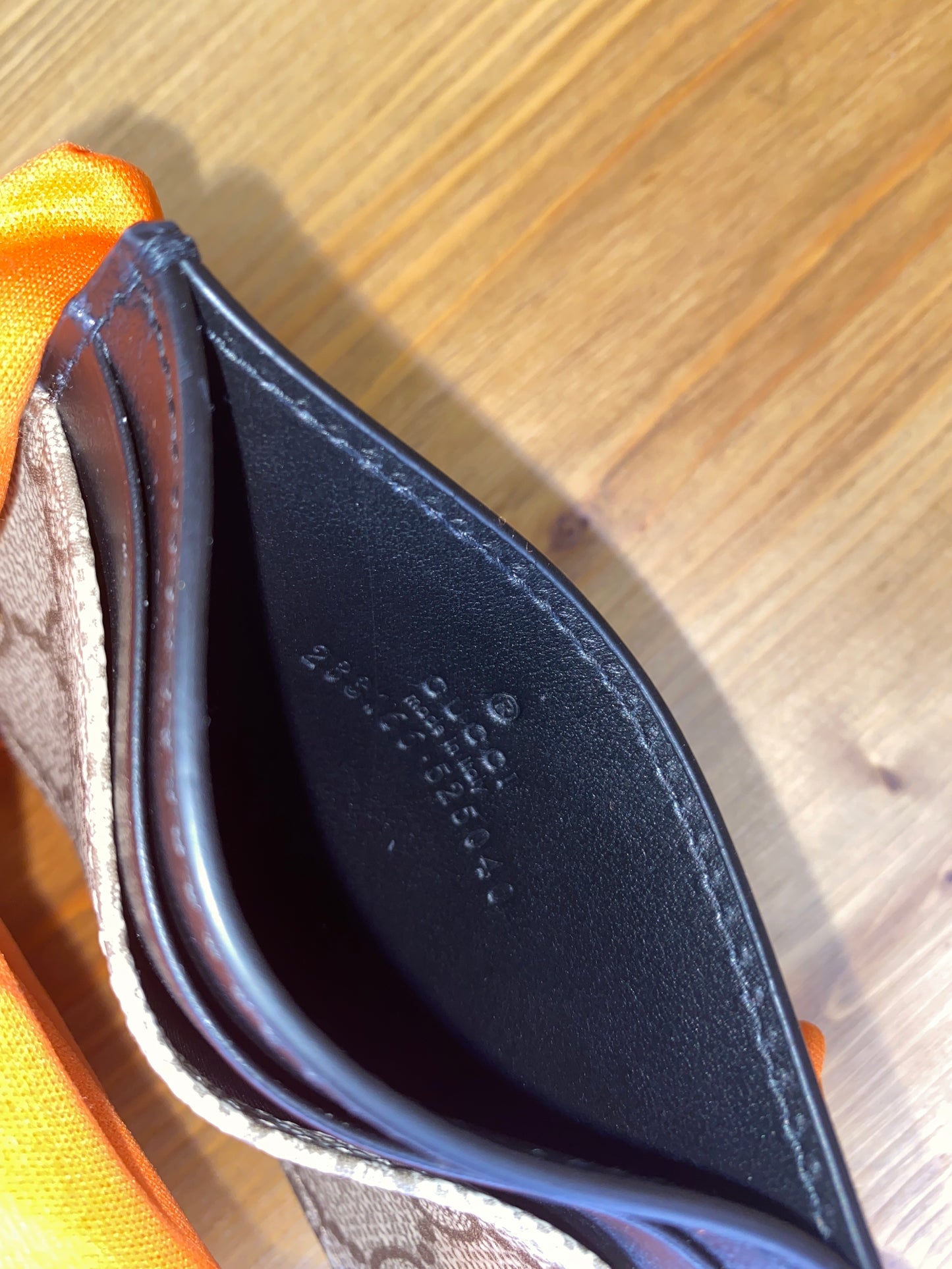 Portacarte Gucci in pelle monogram Marrone