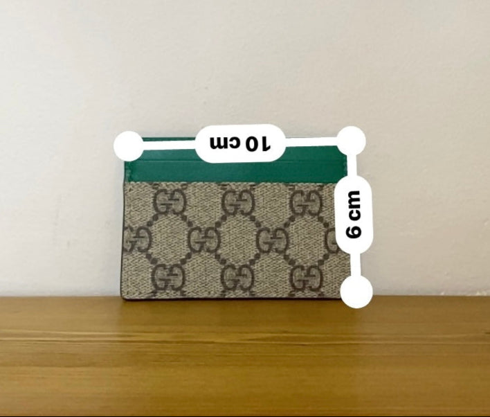 Portacarte Gucci in pelle monogram verde